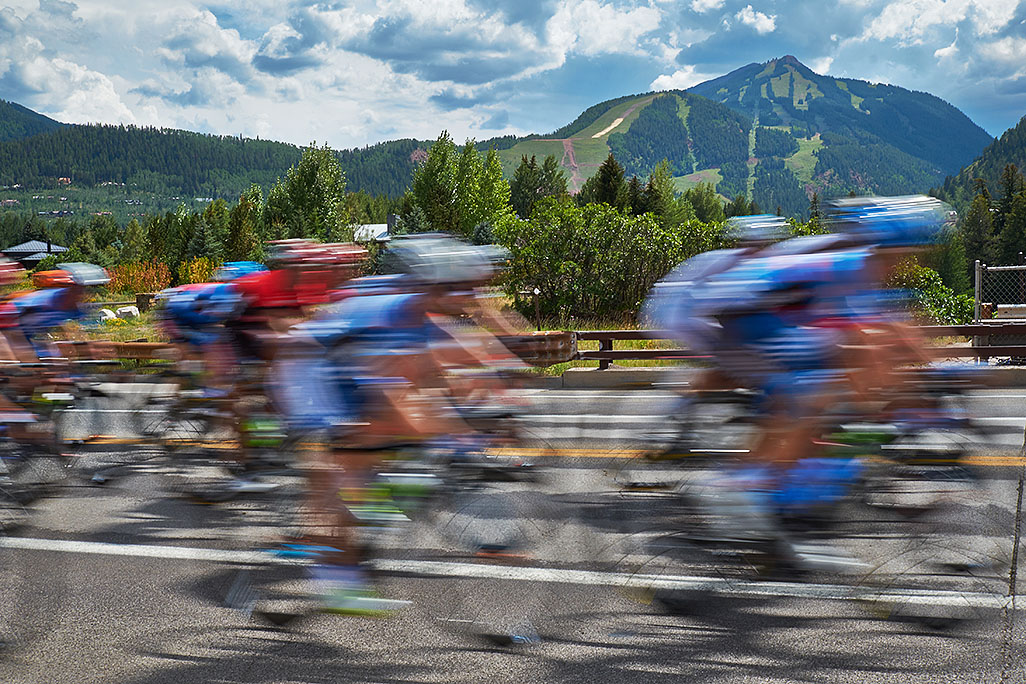 USA Pro Cycling Race in Aspen, photographed by Mike Lyons Aspen Highlands in the background
